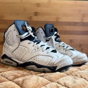 Nike Air Jordan’s White and Black High-Top Sneakers